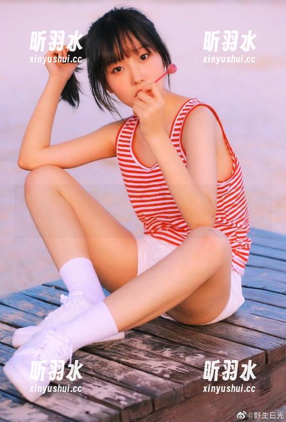 领略兔玩映画的高清图片：旗袍与狂野之美一网打尽